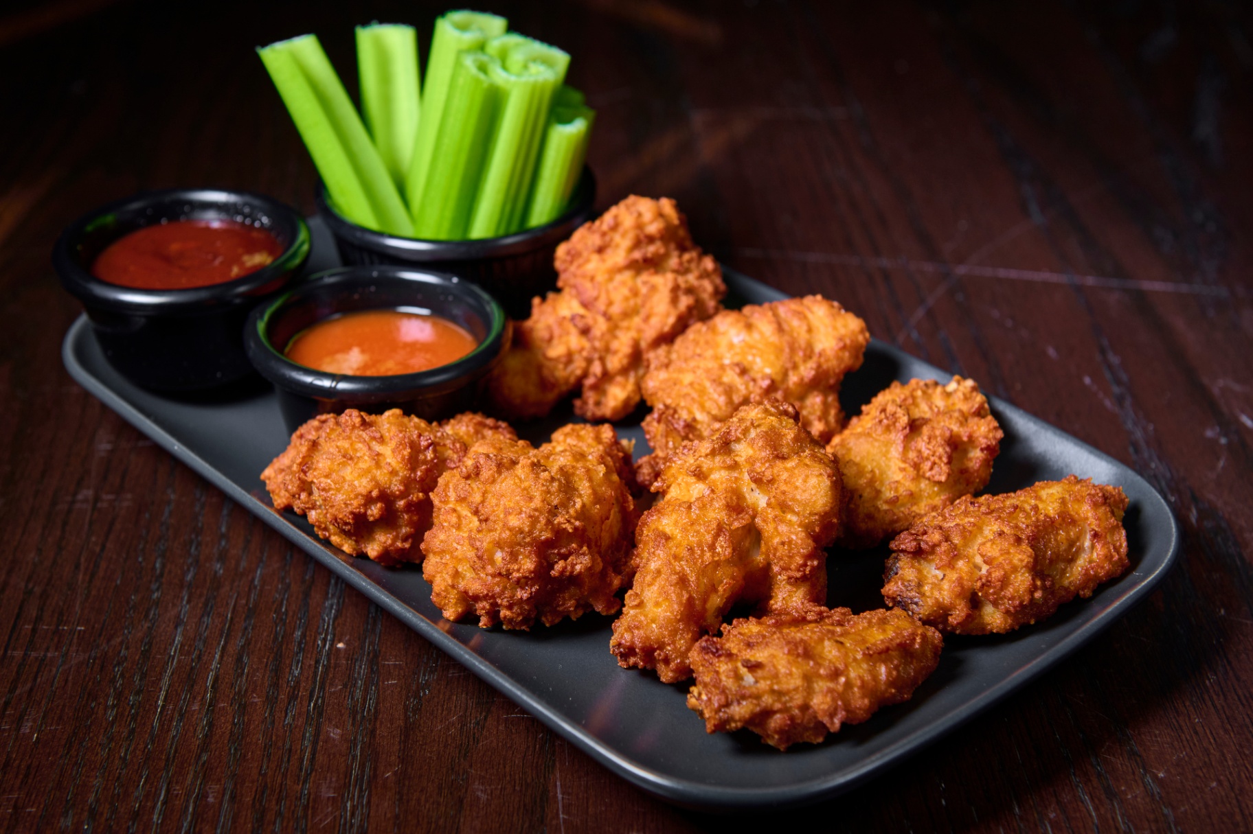 Buffalo chicken wings shareable plate at Platinum Mic Brooklyn hookah and karaoke lounge